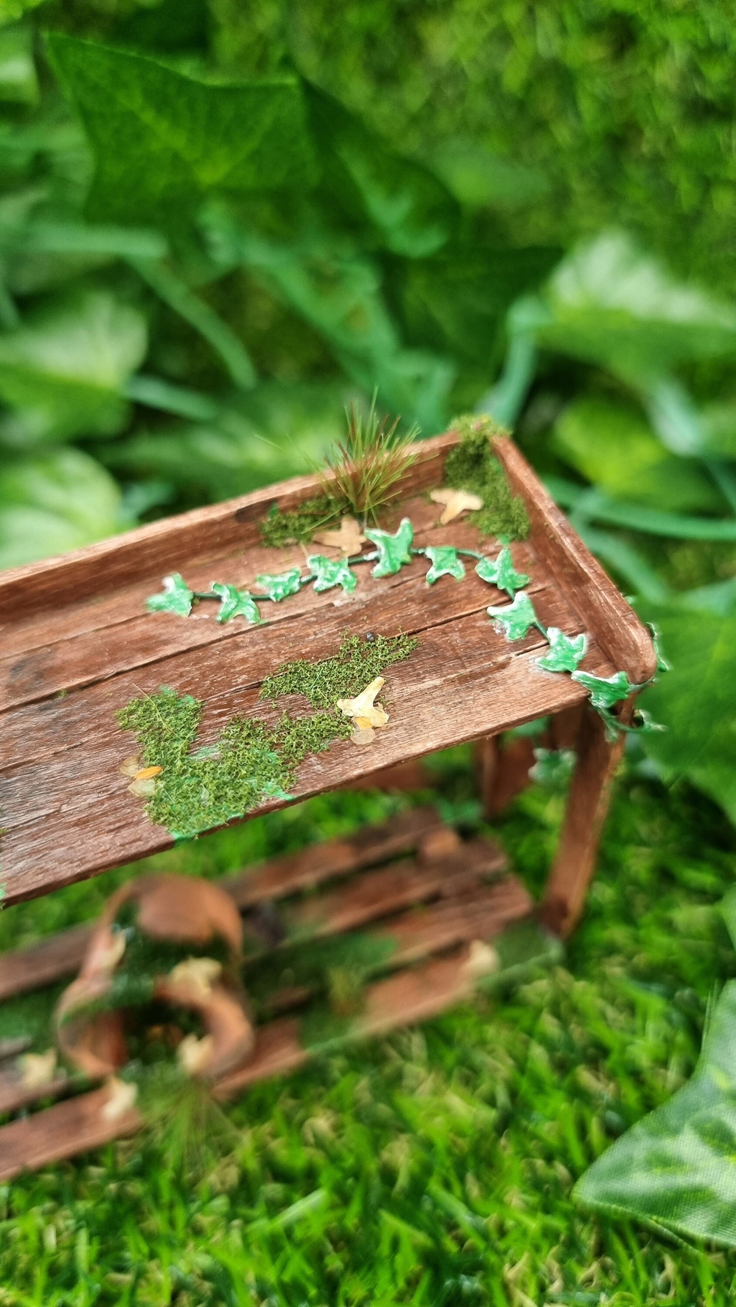 Miniature abandoned potting bench 1:12 scale dollshouse garden furniture with terracotta pot and ivy